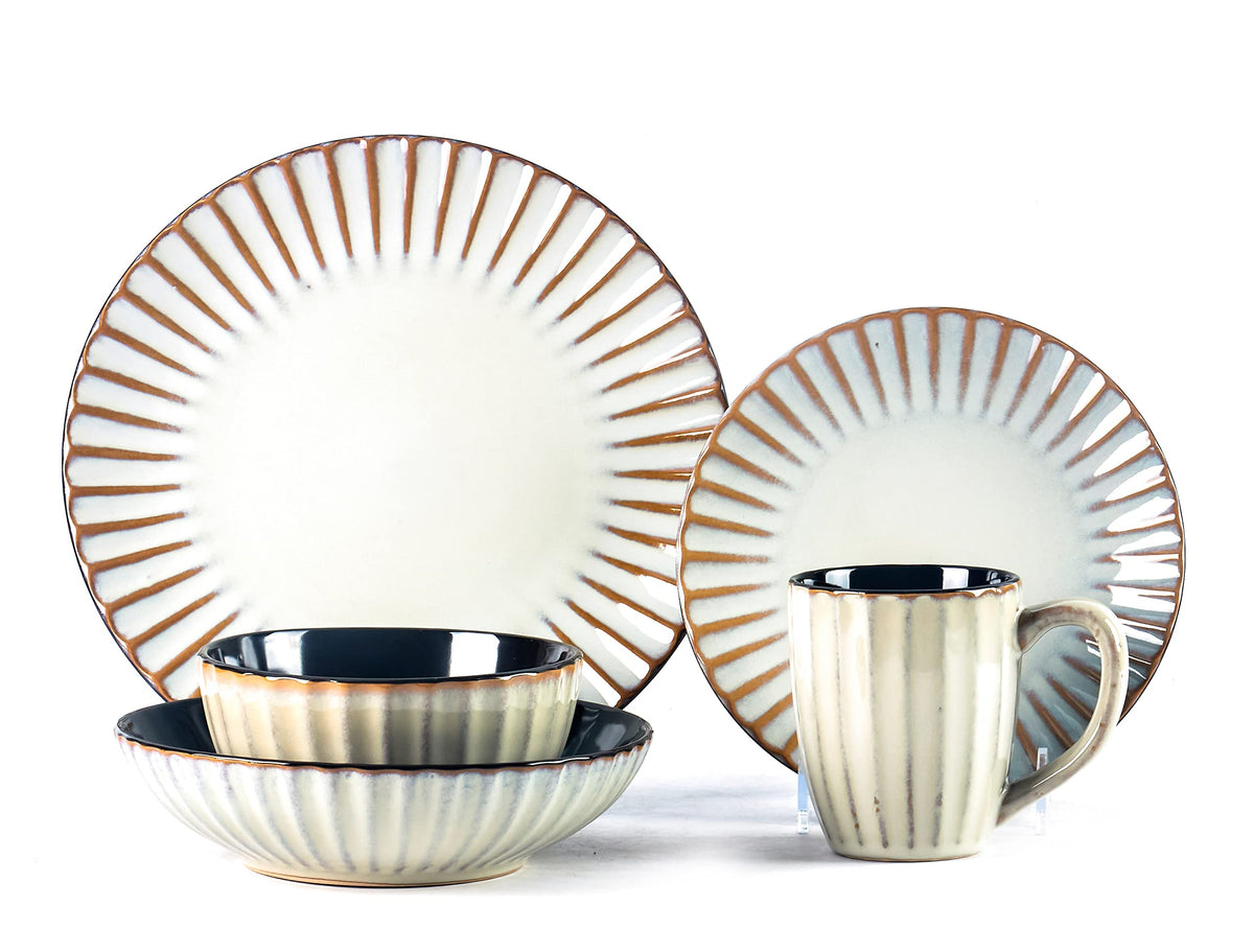 A 20-piece pink striped stoneware dinnerware set, including various plates and a mug, displayed against a white background.